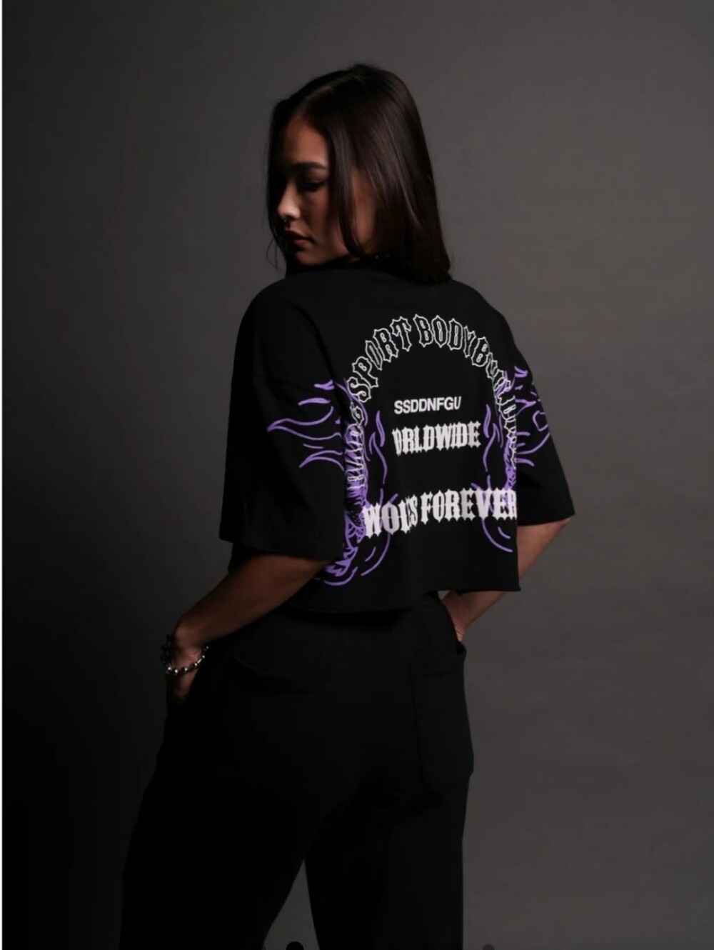 Darc Sport Worldwide Black Cropped Graphic Tee with Purple Flame Detail